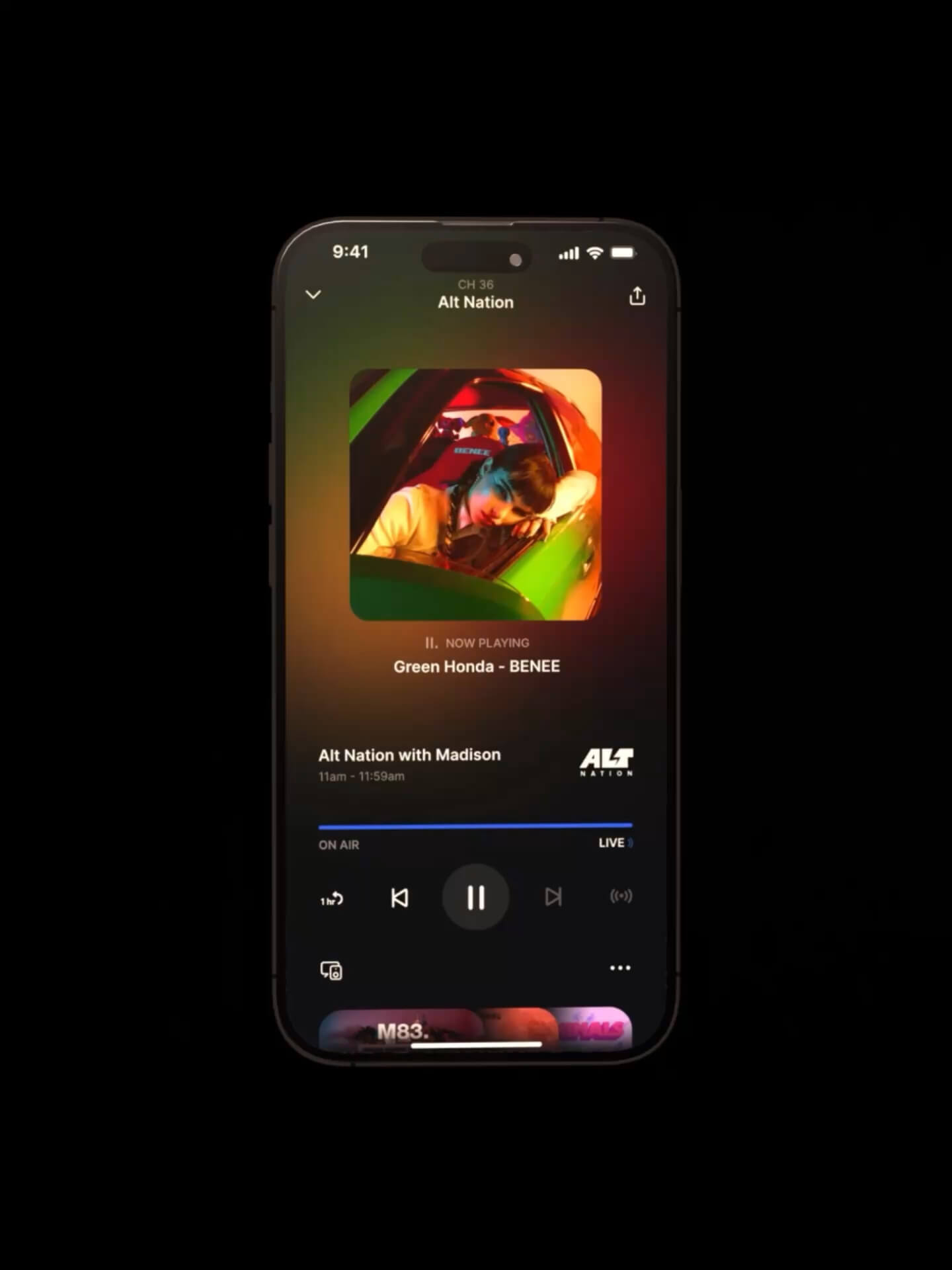 Chris standing up holding his daughter Elva